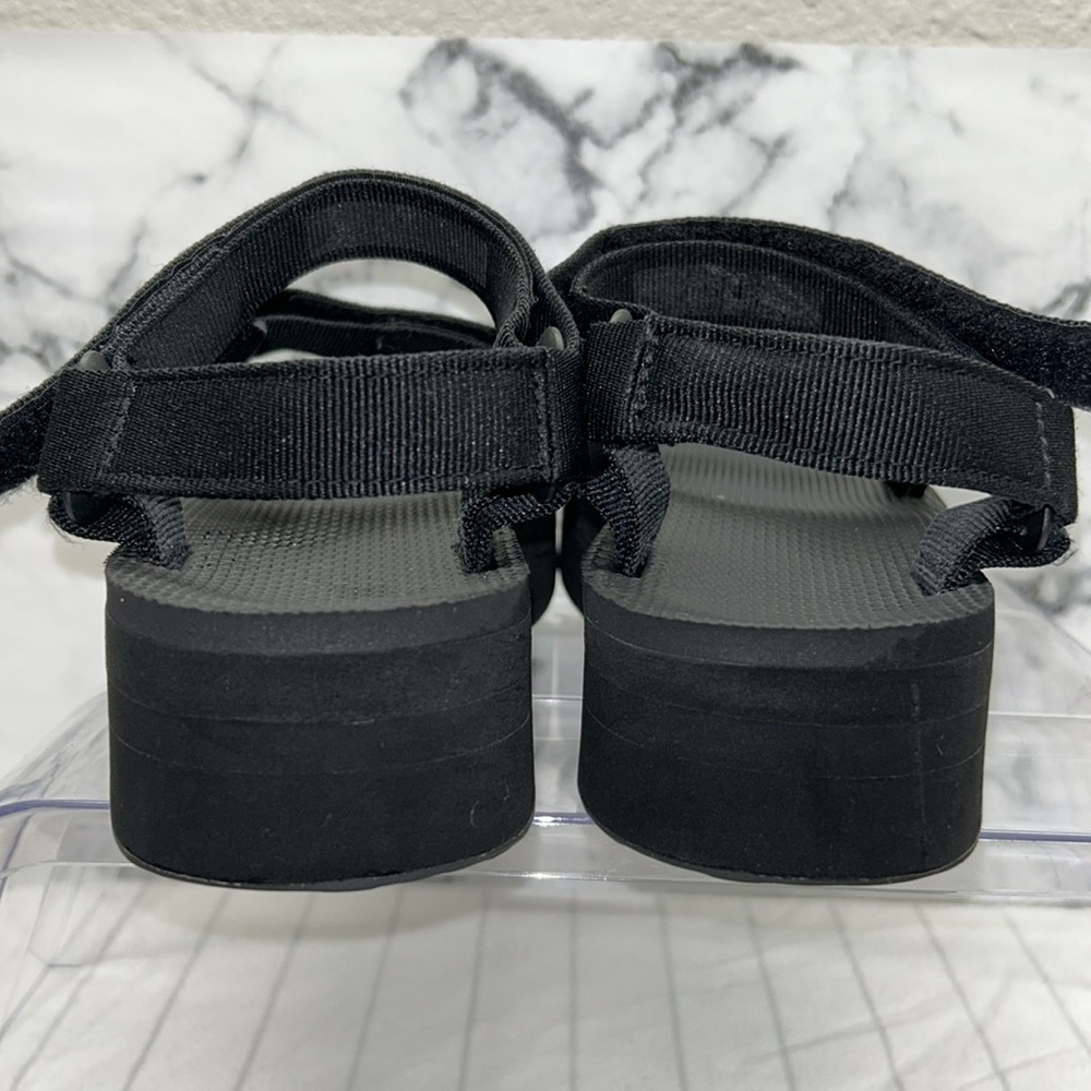 Teva Black Sandals with Gold Logo Flatform Universal Sandal - Picture 4 of 10